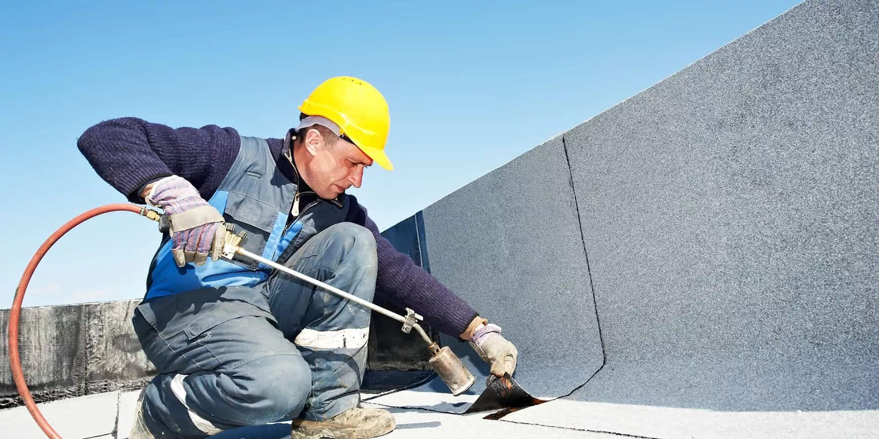 Flat-Roof-Repair-1800x900 (1).jpg